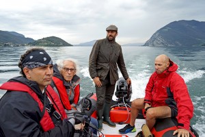 Christo (2nd from left), Director of Construction Rossen Jeliaskov (right), filmmaker Antonio Ferrera (left) and Vladimir Yavachev on Lake Iseo September 2014 Photo: Wolfgang Volz © 2014 Christo